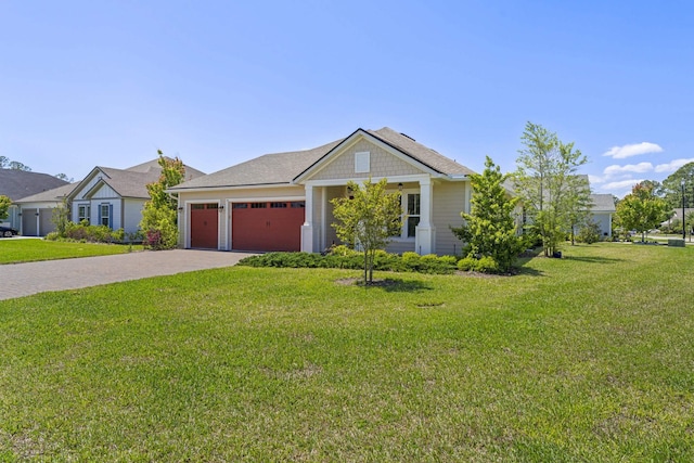 443 Pescado Dr, Saint Augustine, FL 32095 - ranch-style home featuring a front yard, driveway, and an attached garage