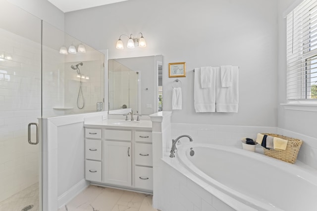 443 Pescado Dr, Saint Augustine, FL 32095 - full bathroom featuring a shower stall, marble finish floor, vanity, and a garden tub