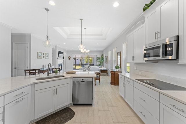 443 Pescado Dr, Saint Augustine, FL 32095 - kitchen featuring recessed lighting, hanging light fixtures, a sink, and appliances with stainless steel finishes