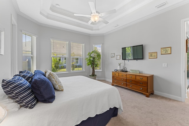443 Pescado Dr, Saint Augustine, FL 32095 - bedroom with baseboards, ornamental molding, visible vents, a tray ceiling, and carpet