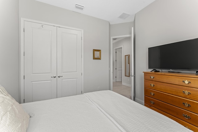 443 Pescado Dr, Saint Augustine, FL 32095 - bedroom featuring a closet, baseboards, and visible vents