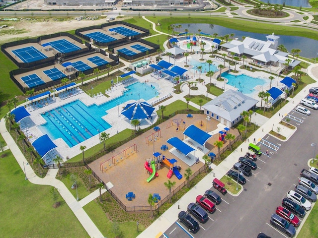 drone / aerial view with a water view