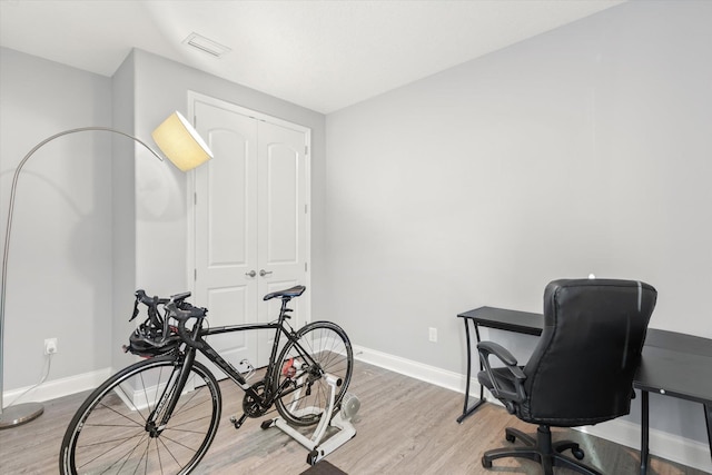 office area with light wood-type flooring