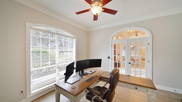 office with baseboards, french doors, a ceiling fan, and crown molding