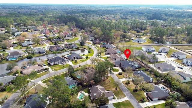 aerial view featuring a water view and a residential view