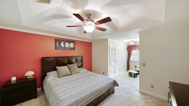 bedroom with crown molding, baseboards, a textured ceiling, and light colored carpet