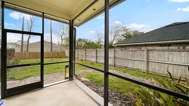 unfurnished sunroom with plenty of natural light