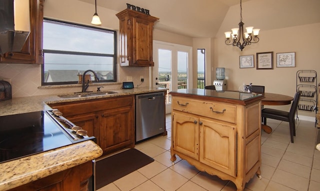 kitchen featuring a chandelier, stainless steel dishwasher, tasteful backsplash, hanging light fixtures, and sink