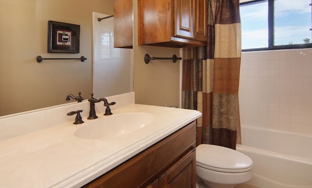 full bathroom with toilet, vanity, and shower / bathtub combination with curtain