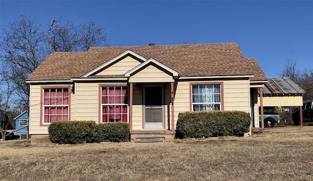 view of front of home with a front yard