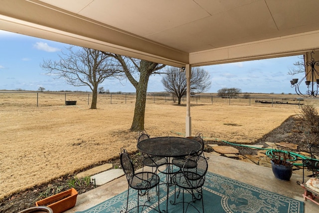 view of terrace featuring a rural view