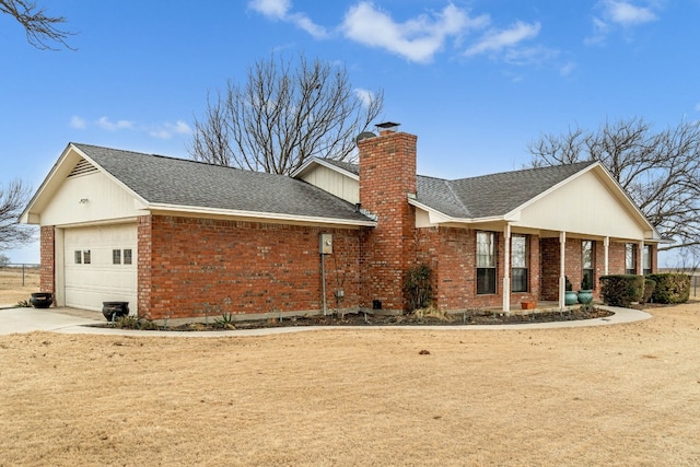 ranch-style house featuring a garage