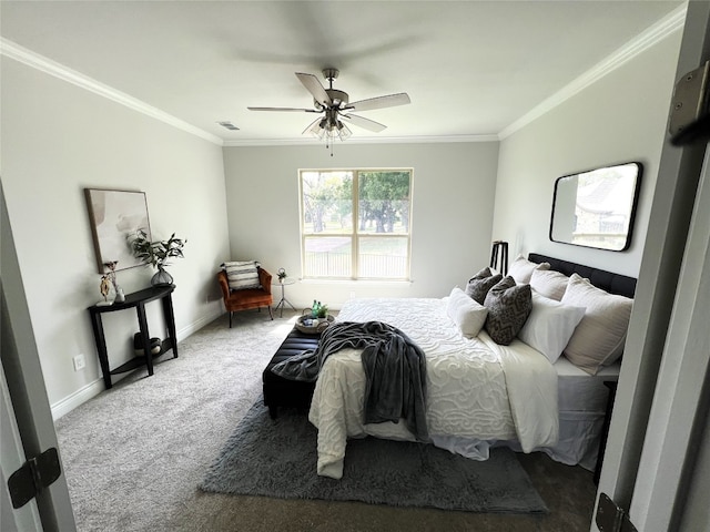 bedroom featuring ceiling fan, ornamental molding, and carpet floors