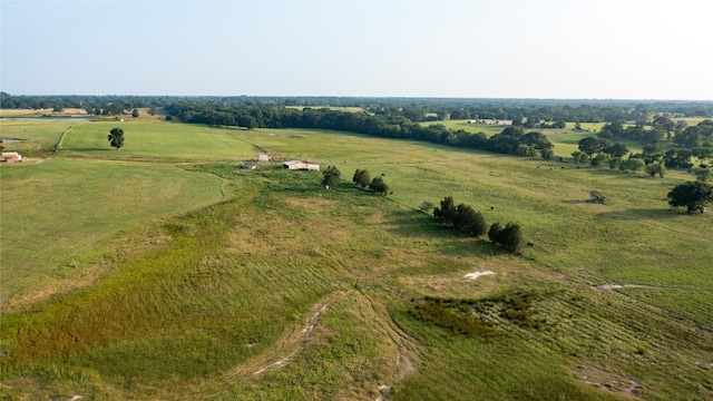 birds eye view of property featuring a rural view