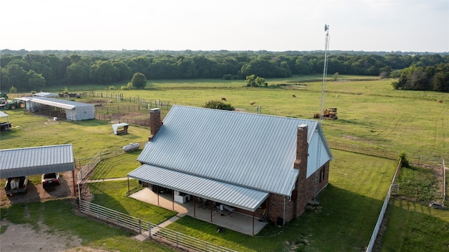 birds eye view of property featuring a rural view