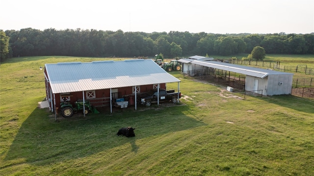 birds eye view of property featuring a rural view