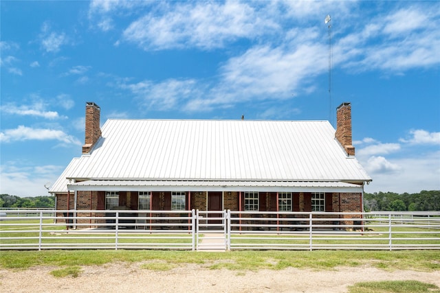 view of stable featuring a rural view