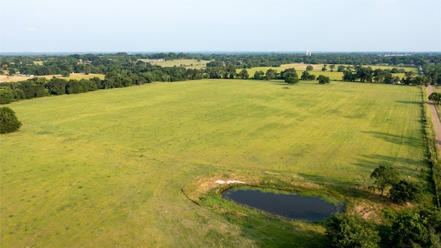 aerial view with a water view and a rural view