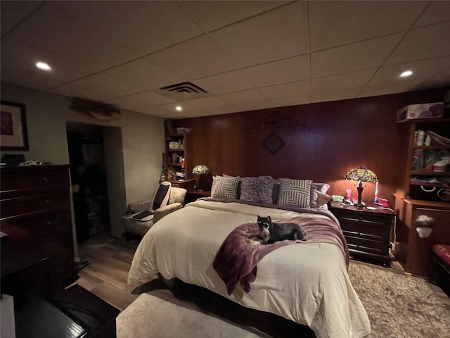 bedroom with a drop ceiling