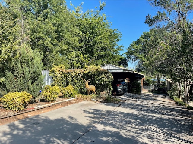 view of front facade with a carport