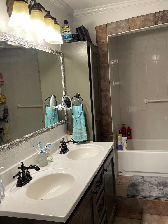 bathroom featuring tiled shower / bath combo, dual sinks, ornamental molding, large vanity, and tile floors