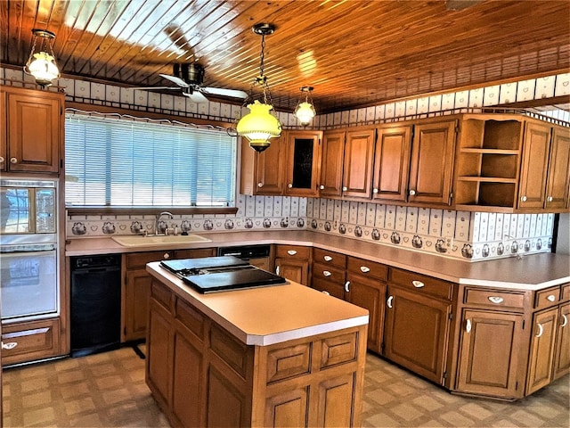 kitchen featuring a kitchen island, wooden ceiling, ceiling fan, hanging light fixtures, and sink