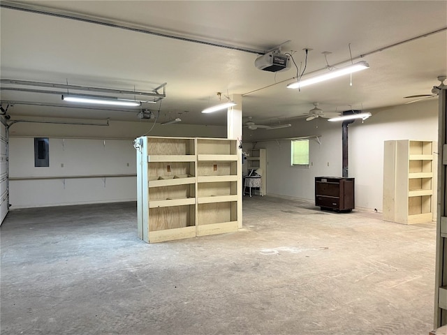 garage featuring a garage door opener and ceiling fan