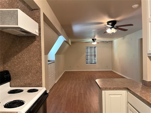 kitchen featuring ceiling fan, dark hardwood / wood-style flooring, white cabinets, premium range hood, and white electric range