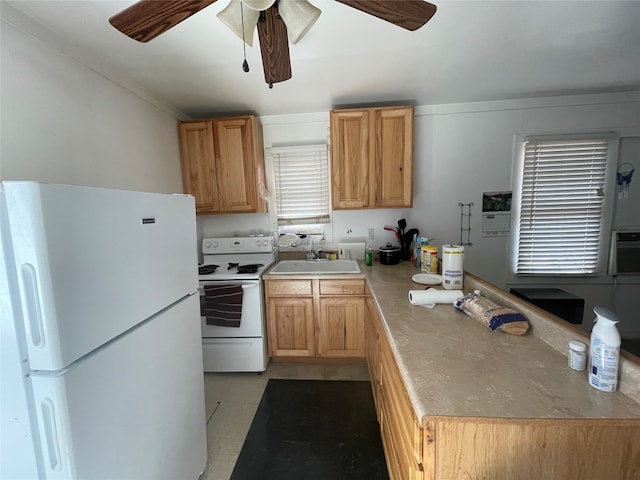 kitchen featuring light tile floors, ceiling fan, white appliances, and sink