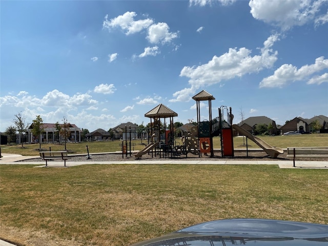 view of jungle gym featuring a yard