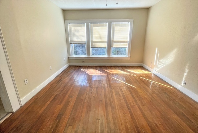 unfurnished room featuring light hardwood / wood-style floors