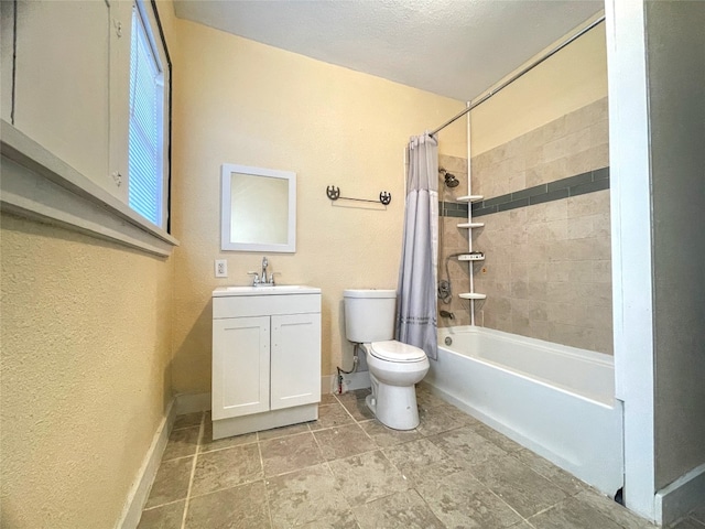 full bathroom with tile floors, toilet, shower / bath combo, and vanity