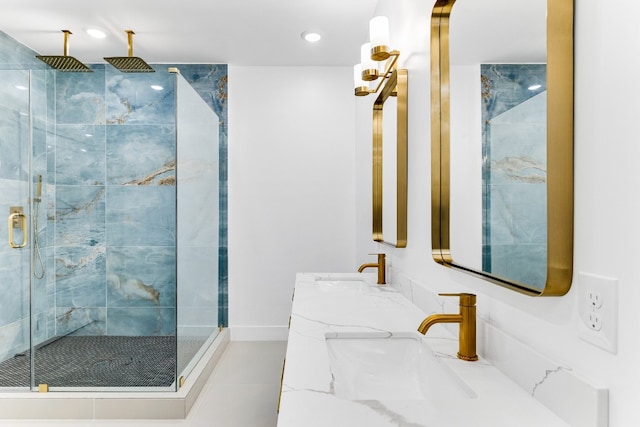 bathroom featuring tile flooring, double sink vanity, and an enclosed shower