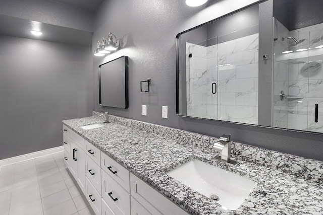 bathroom with an enclosed shower, tile floors, and double vanity