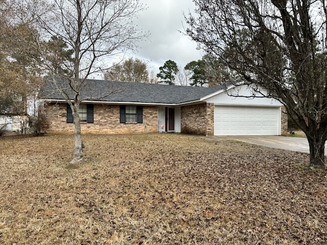 ranch-style house featuring a garage