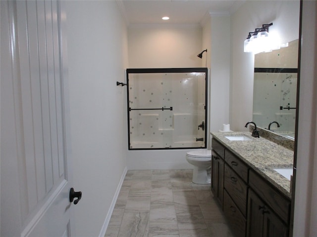 full bathroom featuring combined bath / shower with glass door, double vanity, tile flooring, toilet, and crown molding