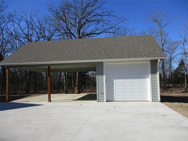 garage featuring a carport