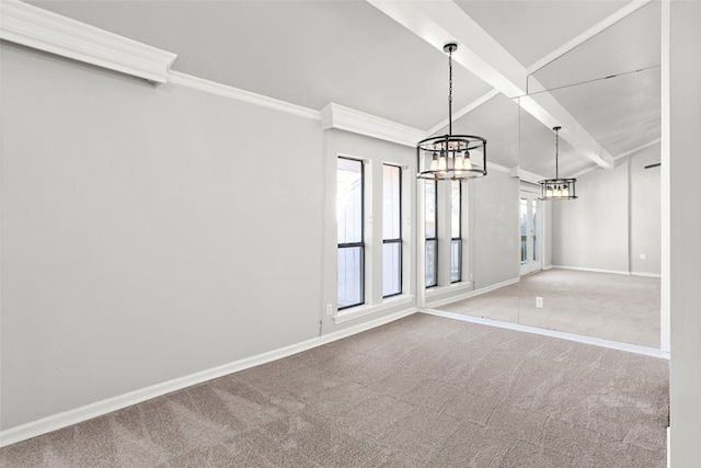 spare room featuring plenty of natural light, an inviting chandelier, beam ceiling, and light colored carpet