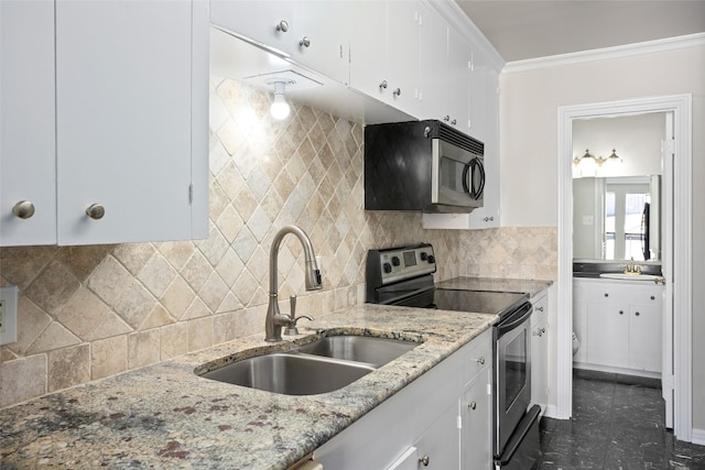 kitchen with white cabinetry, stainless steel range with electric cooktop, sink, light stone countertops, and decorative backsplash