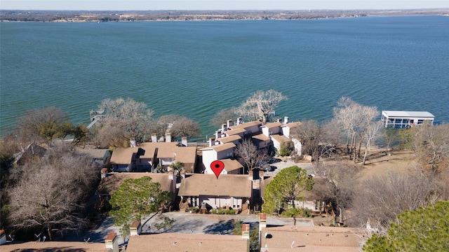 birds eye view of property with a residential view and a water view