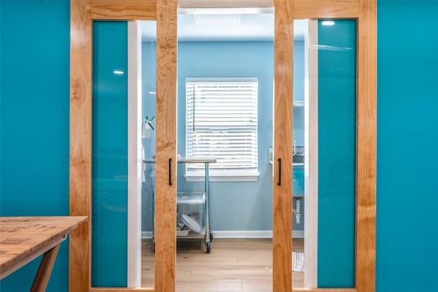 bathroom with vanity and hardwood / wood-style floors