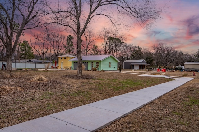 view of front of property with a yard