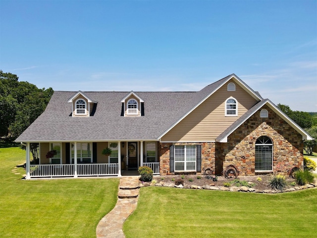 view of front of house featuring a front lawn and a porch