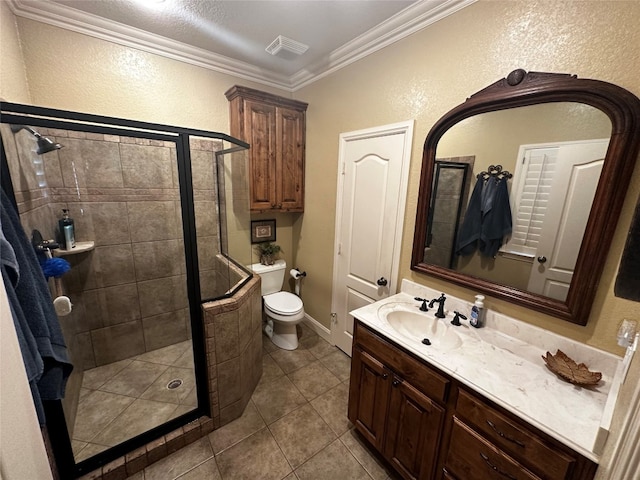 bathroom featuring toilet, oversized vanity, ornamental molding, tile flooring, and an enclosed shower