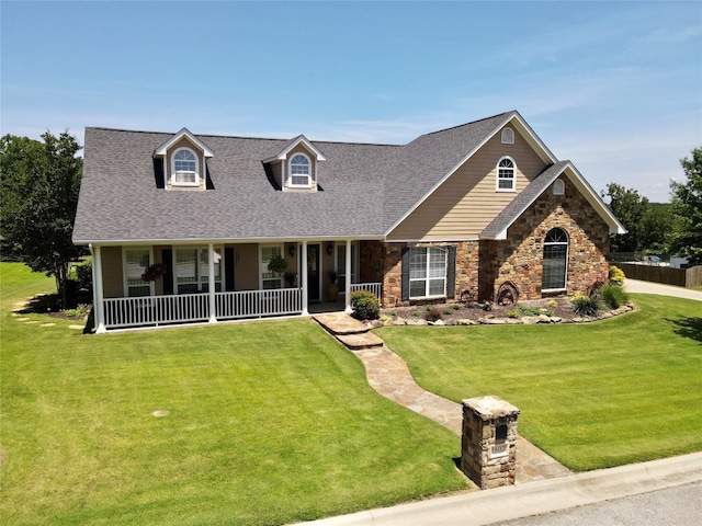 view of front of home featuring a front lawn and a porch