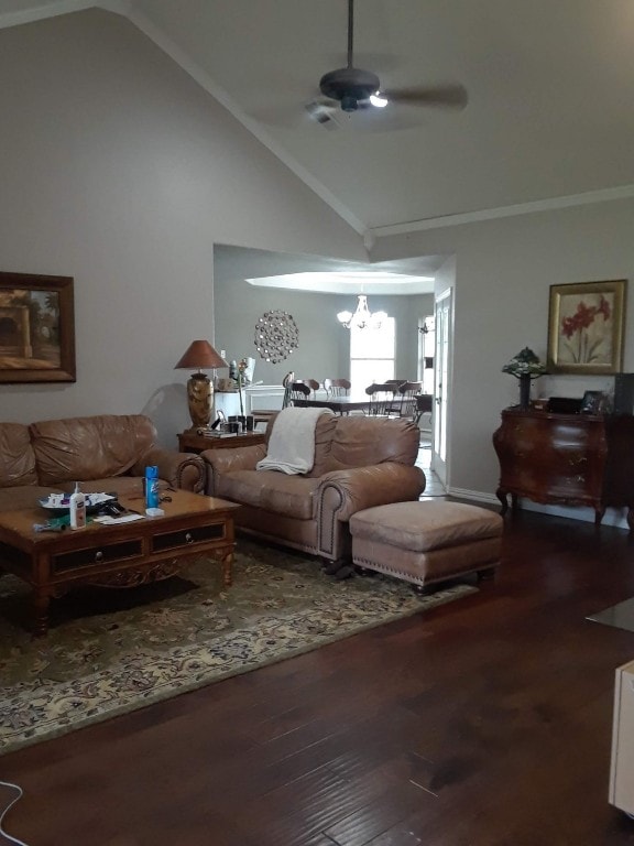 living room featuring high vaulted ceiling, dark hardwood / wood-style floors, ceiling fan with notable chandelier, and ornamental molding