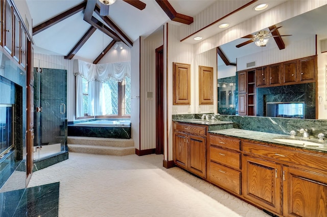 bathroom featuring ceiling fan, vanity, shower with separate bathtub, and lofted ceiling with beams