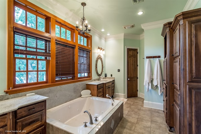 bathroom featuring a notable chandelier, ornamental molding, a wealth of natural light, and vanity