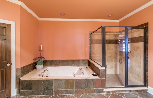 bathroom featuring crown molding and plus walk in shower