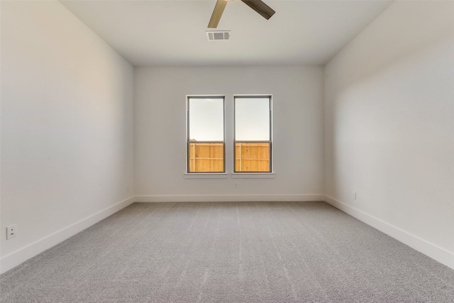 unfurnished room featuring carpet flooring